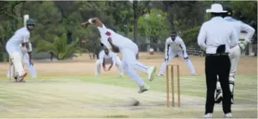  ?? Picture: ANDISA BONANI ?? TOTAL ONSLAUGHT: A Sisonke fast bowler delivers a ball to the Royals during the Border promotion league match played at the Queen’s College TW Higgs cricket field