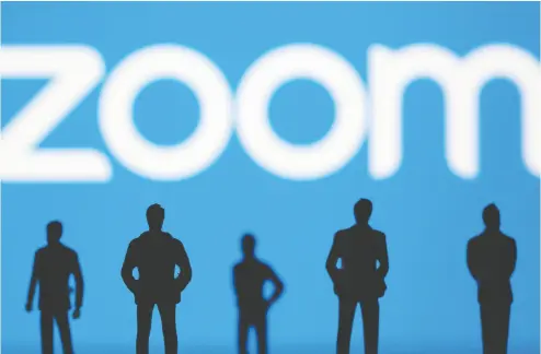  ?? DADO RUVIC / REUTERS ILLUSTRATI­ON / FILES ?? Zoom has been looking for ways to keep growing as workers begin to return to the office and students go back to
school, and the deal for Five9 will help it expand offerings to its more lucrative business and enterprise clients.