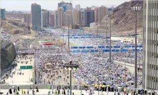  ??  ?? Hajj pilgrims stream into Makkah from Mina after performing the Jamrat ritual. (SPA)