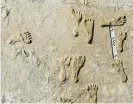  ?? ?? Human fossilized footprints at the White Sands national park in New Mexico. Photograph: AP