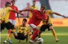  ??  ?? Luca Waldschmid­t gets away from a clutch of defenders during Benfica’s game against Moreirense. Photograph: Manuel de Almeida/EPA