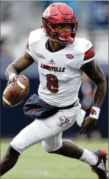  ?? JOE ROBBINS / GETTY IMAGES ?? “If I have to sit behind somebody and learn, a veteran, I have no problem with it,” says Louisville quarterbac­k Lamar Jackson. Jackson will not run the 40-yard dash today.