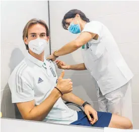  ?? Photo / AP. ?? Army medics on Friday vaccinated Spain’s soccer team before their first European Championsh­ip match.