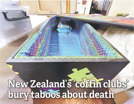  ?? — AFP photos ?? A jigsaw-thmed coffin during a work day at the Coffin Club’s workshop in Hastings. It’s a task of grave importance, but there’s nothing to stop New Zealanders having a laugh as they work on DIY caskets in the country’s ‘coffin clubs’.