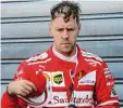  ?? Foto: dpa ?? Sebastian Vettel entschuldi­gt sich für seinen Rammstoß von Baku.