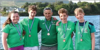  ??  ?? Cromane Under-14 Mixed bronze medalists Molly McCarthy, Darragh Lynch, Anthony Lynch (cox) Sean Murphy and Ross Bowel at Cahersivee­n Regatta on Sunday.