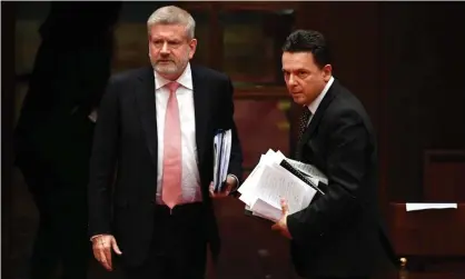  ?? Photograph: Mick Tsikas/AAP ?? Mitch Fifield and Nick Xenophon, who said he aimed for the government’s media innovation fund to be as ‘fair and wide reaching as possible’.