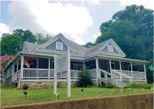  ?? Staff photos by Aaron Brand ?? ■ The Eddings believe the dogtrot-style house was built around 1916, although tax records say 1920.