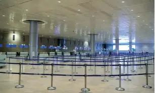  ?? (Flash90) ?? THE EMPTY departures hall of Ben-Gurion Airport on Sunday.