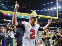  ?? JONATHAN BACHMAN / GETTY IMAGES ?? Matt Ryan exults as he leaves the field Sunday. “When you’re 1-7, you think, ‘Where has the consistenc­y been?’ ” he said. “But when it was there like it was today, you have to keep locked in and focused on the task at hand.”