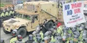  ?? AFP ?? Protests held as the missile defence equipment enters Seongju.