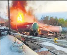  ?? REUTERS ?? (Left to right) Firefighte­rs gather near tank cars as they work to extinguish a fire at an oil depot in the Budyonnovs­ky district of Donetsk, while a firefighte­r works at the site of a residentia­l area damaged by a Russian missile strike in the settlement of Zatoka, Odesa region, Ukraine, on Tuesday.