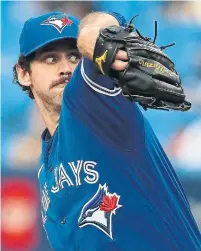  ?? STEVE RUSSELL TORONTO STAR ?? Blue Jays closer Jordan Romano deals in the ninth inning against the Rays Wednesday, on the way to his 18th save.