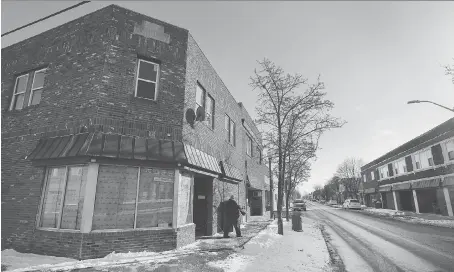  ?? DAN JANISSE ?? A section of Ford City on Drouillard Road, shown on Thursday, will be eligible for a proposed facade improvemen­t plan. City council will decide on Jan. 8 whether to approve the program that aims to help retain business and create more attractive,...