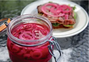  ?? Tribune News Service ?? ■ Quick Red Onion Pickles are ready to use almost immediatel­y, though they will taste better after two days.