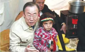  ??  ?? IRBIL: In this Jan 4, 2014, file photo, United Nations Secretary-General Ban Ki-moon sits inside a tent belonging to a Syrian refugee family at a refugee camp. — AP