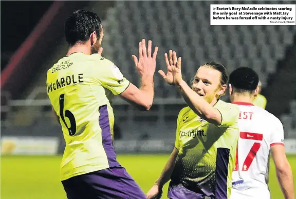  ?? Micah Crook/PPAUK ?? Exeter’s Rory McArdle celebrates scoring the only goal at Stevenage with Matt Jay before he was forced off with a nasty injury