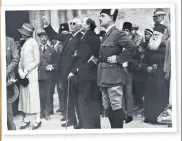  ??  ?? Family pride: the 5th Earl of Balfour stands by a portrait of his ancestor, left. Lord Arthur Balfour (pointing) during a visit to Jerusalem in 1925, above