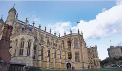  ?? ALASTAIR GRANT/ASSOCIATED PRESS FILE PHOTO ?? St. George’s Chapel, as seen from within the walls of of Windsor Castle, in Windsor, England. U.S. visitation to the United Kingdom has been booming and is expected to stay strong in 2018 thanks to the upcoming royal wedding of Prince Harry to Meghan...