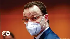  ??  ?? German Health Minister Jens Spahn wears a protective mask as he attends a weekly Cabinet meeting in Berlin