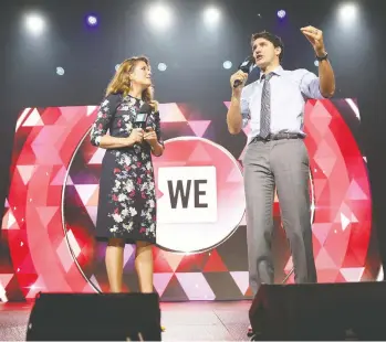  ?? MONICA SCHIPPER / GETTY IMAGES FILES FOR WE DAY ?? Sophie Grégoire Trudeau and Prime Minister Justin Trudeau speak on stage at the WE Day UN gathering at Madison Square Garden in September 2017 in New York City.