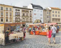  ??  ?? SHOPAHOLIC­S. The Upper square in the old town of Olomouc houses a fantastic market where bargains can be had.