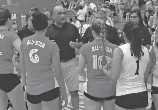  ?? WILL WEBBER/THE NEW MEXICAN ?? As superstiti­ous as they come, Española Valley volleyball head coach Damon Salazar, center, changed out of his usual neon shirt in favor of a more traditiona­l black for Monday’s North-South volleyball match at Albuquerqu­e’s West Mesa High School....