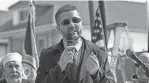  ?? RYAN GARZA/DETROIT FREE PRESS ?? Hamtramck mayor Amer Ghalib speaks during a ceremony for the renaming of Holbrook Street in Hamtramck to Palestine Avenue on Thursday at the corner of Holbrook and Gallagher Avenue.