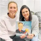  ?? Photo / Emma Twigg Facebook ?? Olympian Emma Twigg and author Jessica Lawry holding the new book about Emma’s journey.