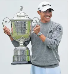  ?? /Kelvin Kuo-USA TODAY Sports ?? On cloud nine: Collin Morikawa hoists the Wanamaker Trophy.