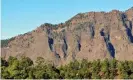  ??  ?? A steep rock wall of the caldera on La Palma. ‘A raw landscape, the volcanic features still steep and sharp.’ Photograph: John Gilbey