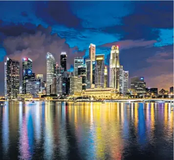  ??  ?? The booming city-state of Singapore can offer useful lessons to British politician­s on both sides of the House of Commons