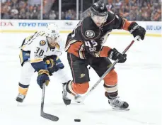  ?? KELVIN KUO, USA TODAY SPORTS ?? Defenseman Sami Vatanen, right, has averaged 33 points over the last three seasons and could elevate the Golden Knights.