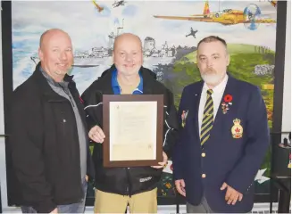  ?? ADAM MACINNIS/THE NEWS ?? Brothers Ian and Glenn MacIntosh are pictured with Westville Legion Vice President Joe Stewart, who helped connect them with a letter that had been addressed to their grandfathe­r 78 years ago.