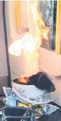  ??  ?? Device in flames on the train