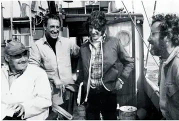  ??  ?? ▲ ALL AT SEA: it’s all smiles for the camera, but Shaw, Scheider, Spielberg and Dreyfuss did not enjoy their time shooting among the elements as much as this picture might indicate…