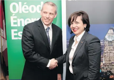  ?? RYAN REMIORZ/THE CANADIAN PRESS ?? Energy East president John Soini greets ABB Canada president and CEO Nathalie Pilon following the signing of a major supply agreement in Montreal on Wednesday.