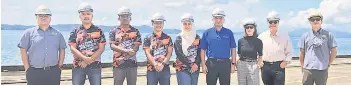  ?? ?? Azman (fourth right) and his officers visiting POIC Lahad Datu Container Terminal on Monday accompanie­d by Head of Marketing and Sales Division, Rose Pun and Port Manager, Clarence Miwil (third right).