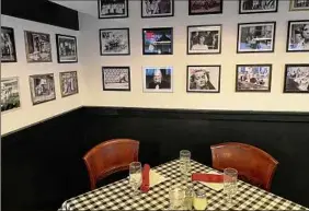  ?? ?? With checkered tablecloth­s and a gallery of photos from the golden era of Hollywood, Papa Brillo's in Pittstown aims to recreate the atmosphere of its predecesso­r, a small New England chan of the same name that was open in the 1970s and '80s.