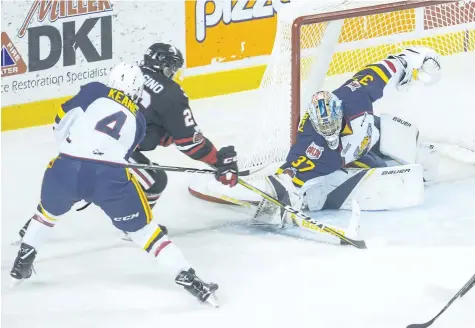  ?? JULIE JOCSAK/ ST. CATHARINES STA ?? Goalie Leo Lazarev of the Barrie Colts defends the net against Philip Tomasino of the Niagara IceDogs in OHL action at the Meridian Centre in downtown St. Catharines on Friday,