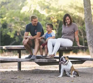  ?? ALEX SOUZA ?? Mark Lukach with wife Giulia, son Jonas, and dog Goose. Mark wrote about Giulia being hospitaliz­ed with mental illness.