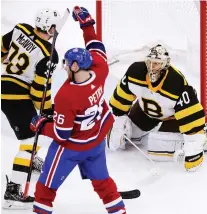  ?? AP PHOTO/CHARLES KRUPA ?? Habs defenceman Jeff Petry raises his fist after beating Bruins goalie Tuukka Rask with the game-winner in OT.