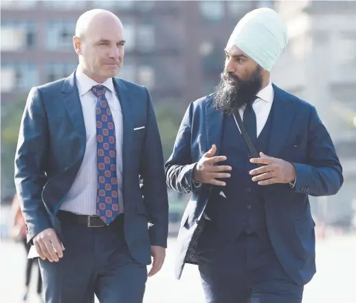  ??  ?? Nathan Cullen et Jagmeet Singh, mercredi, à Ottawa. - La Presse canadienne: Sean Kilpatrick