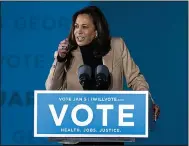  ?? (AP/Stephen B. Morton) ?? Vice President-elect Kamala Harris speaks at a drive-in rally Sunday in Savannah, Ga., during a campaign stop for Democratic U.S. Senate candidates, the Rev. Raphael Warnock and Jon Ossoff.