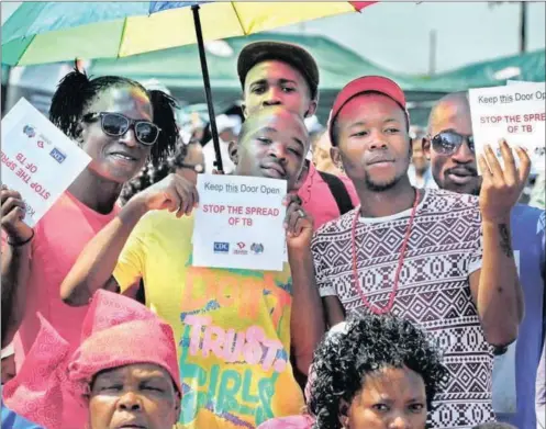  ??  ?? People look on as former president Kgalema Motlanthe addresses the World TB Day event in Fochville, Gauteng, yesterday.