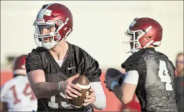  ?? NWA Democrat-Gazette/BEN GOFF ?? Cole Kelley (left), who went 2-2 as the starter last fall while filling in for injured Austin Allen, and Ty Storey are the quarterbac­ks with the most experience under their belts as the Arkansas Razorbacks report to fall camp today.