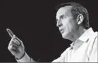  ?? By Charles Dharapak AP ?? Owed $435,000: Tim Pawlenty got help with his campaign debt from Mitt Romney backers.