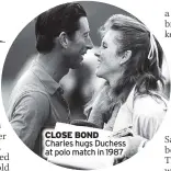 ?? ?? CLOSE BOND Charles hugs Duchess at polo match in 1987