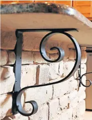  ??  ?? Above: Detail on the island in the outdoor kitchen. Right: Fire pit in an outdoor living space at a home designed by Brent Gibson. [THE OKLAHOMAN ARCHIVES PHOTOS]