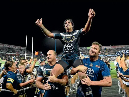  ??  ?? Johnathan Thurston is chaired from the Cowboys’ ground after playing his final home NRL game last weekend.